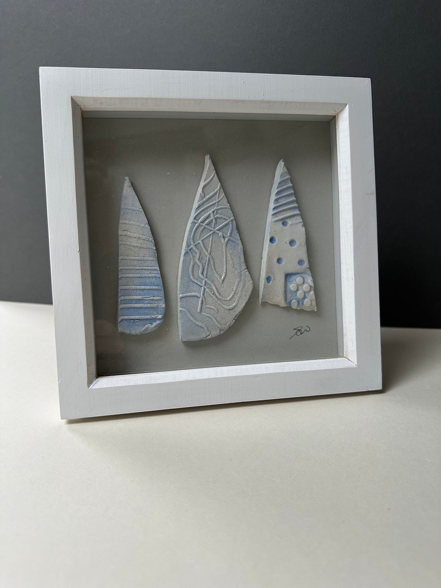 Small ceramics in frame