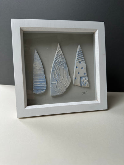 Small ceramics in frame